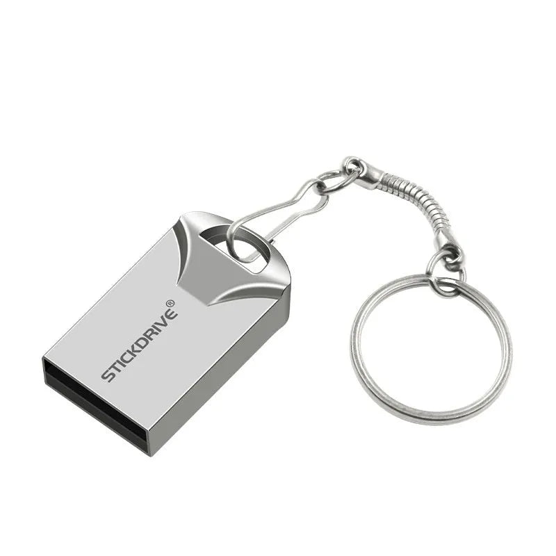 Metal USB flash drive on a keychain ring, shown in black and silver variants with decorative chain attachments.
