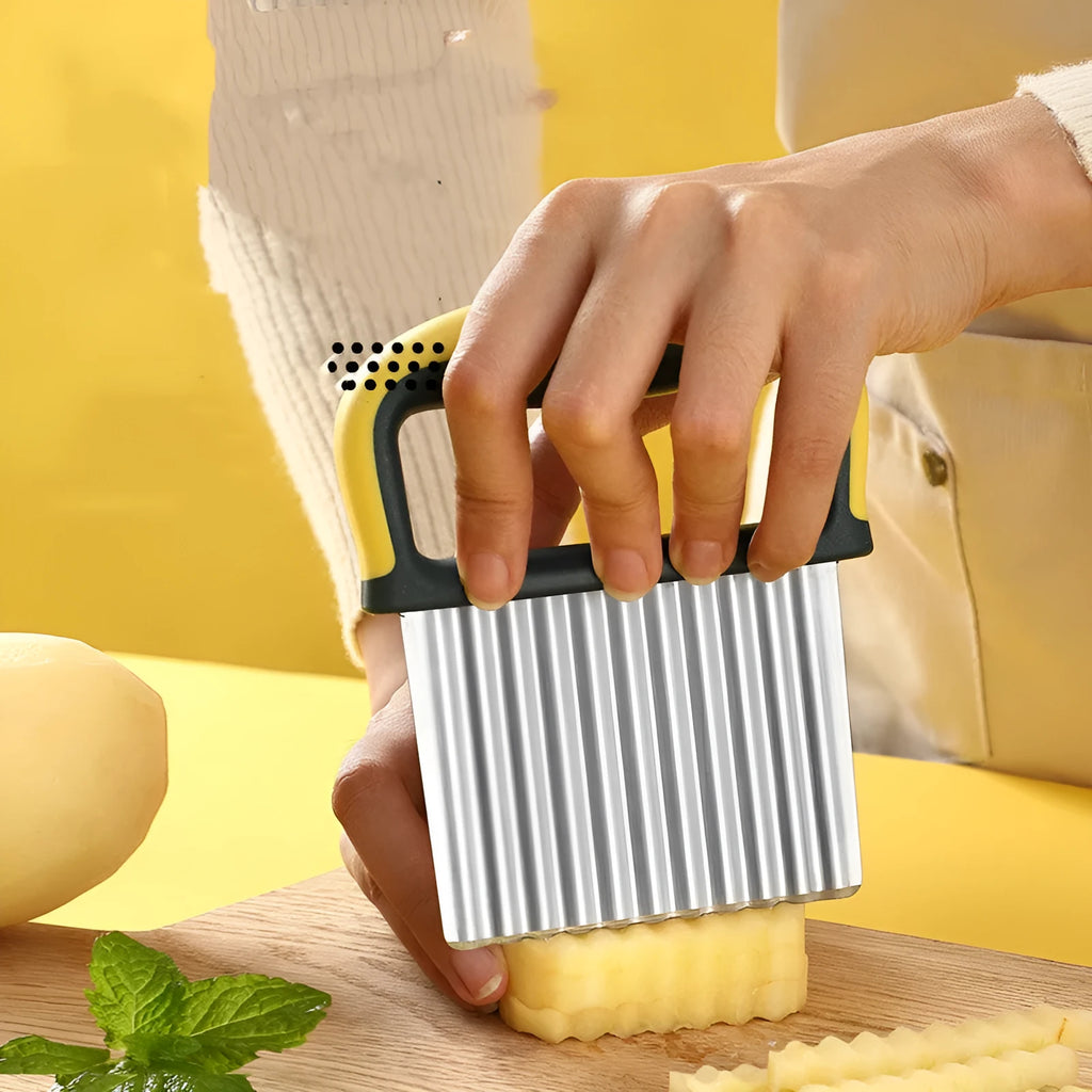 Stainless steel wolf tooth diced potato knife kitchen gadget with wire-drawn face on light background