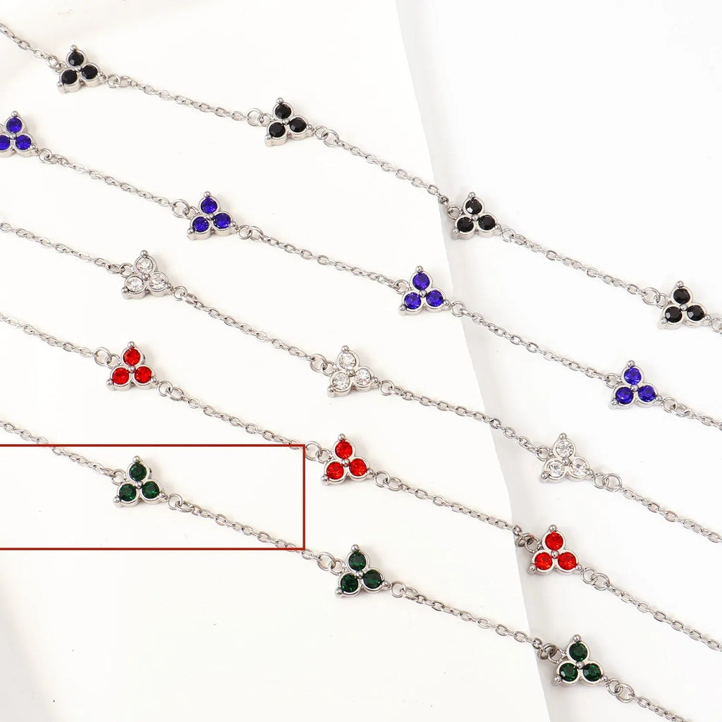 Stainless steel women's bracelet with three triangular zircon stones in a choice of colours and metal finishes.