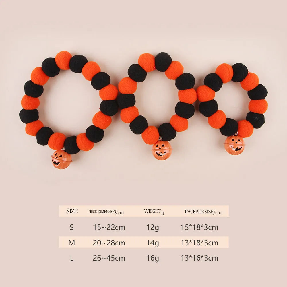 Funny orange pumpkin design cat collar with black details and an adjustable plastic buckle.