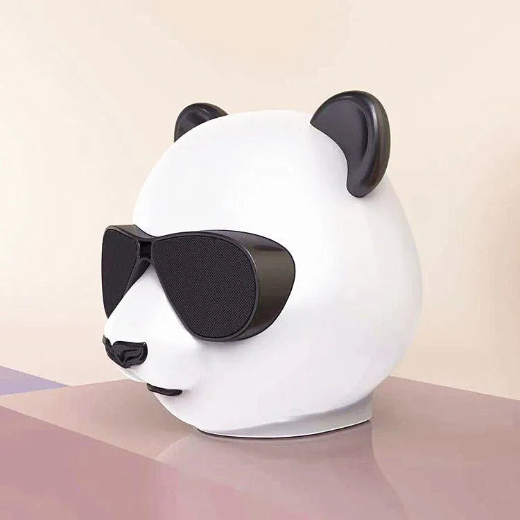 Classic style portable mini Bluetooth speaker with USB charging port.