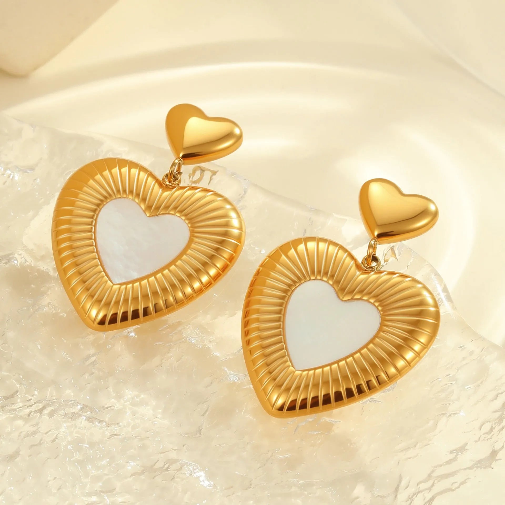 Gold electroplated stainless steel heart earrings with white fritillary pattern