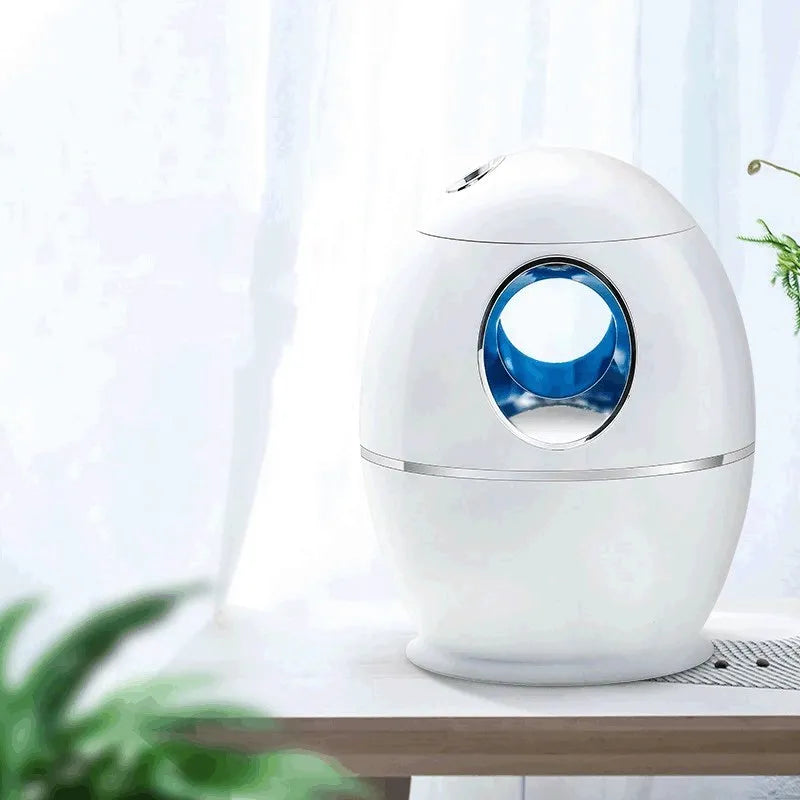 White columnar household mute air disinfection humidifier with single fog outlet on a wooden table
