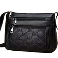 Women's butterfly black PU leather messenger bag with adjustable strap and phone pocket