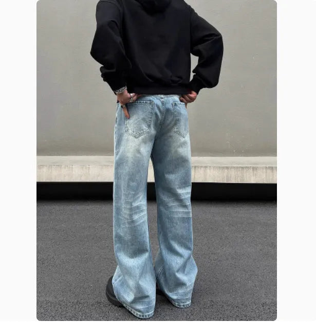 Men's retro whisker washed blue straight jeans with medium-high waist and visible stitching