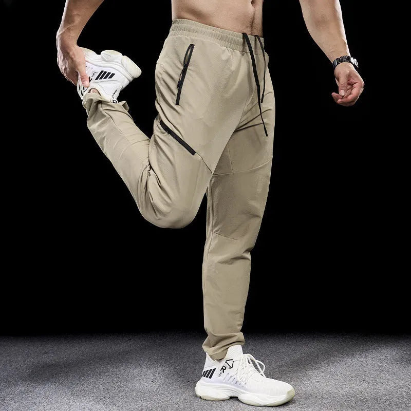 Men's waterproof quick-drying nylon workout pants in multiple colours for sports and fitness