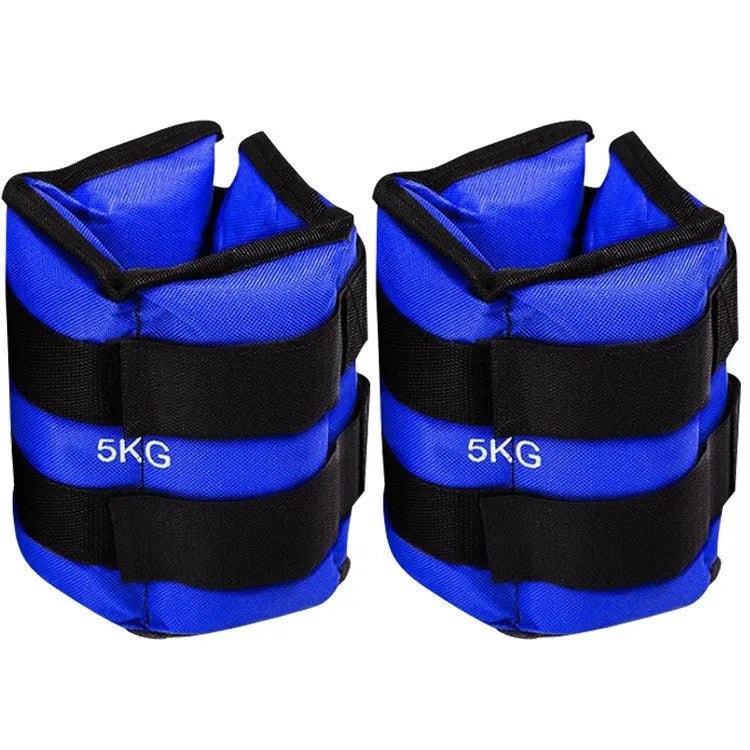 Pair of Oxford cloth legging sandbags for weighted athletic training on a track.