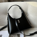 Soft brown genuine leather dumpling-shaped crossbody bag with a front sandwich pocket.