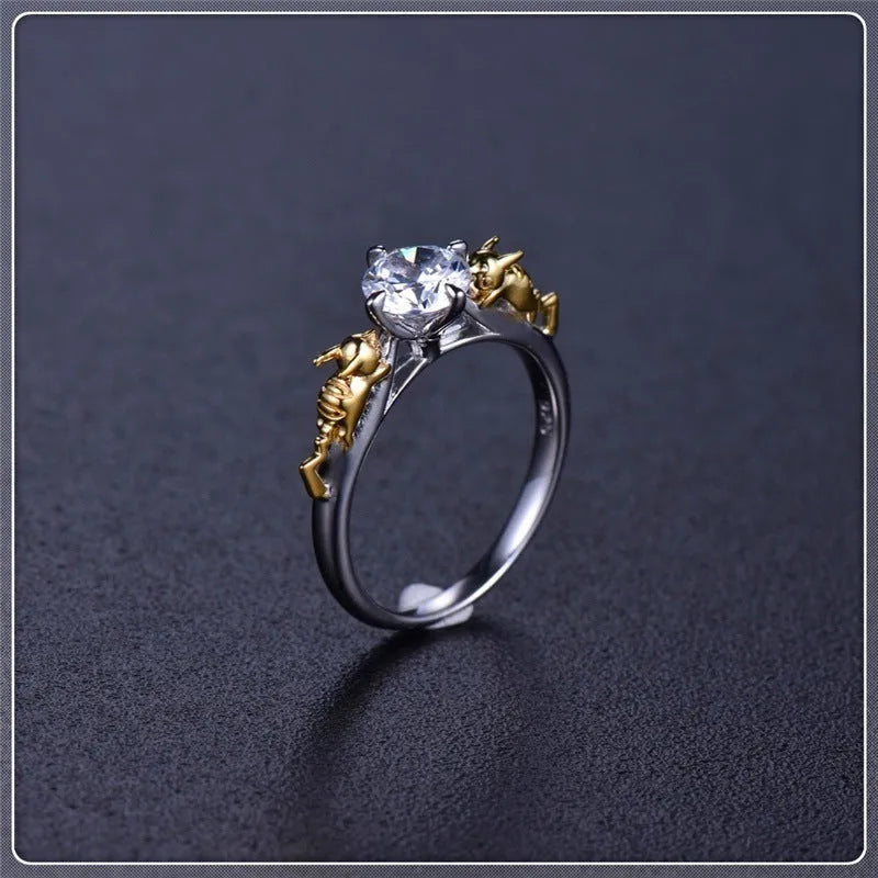 Copper crown crystal ring with black gold finish showing sizing options