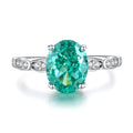 Sterling silver emerald ring with geometric design featuring Palaibahao inlay and high carbon diamond accents