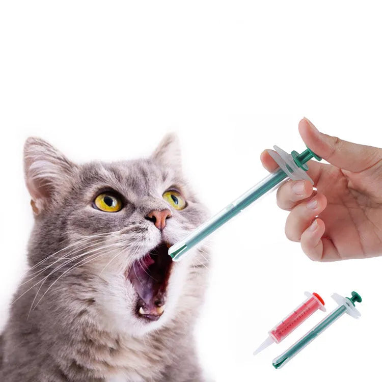 Two silica gel pet pill shooters with soft tips for administering medicine to cats and dogs.