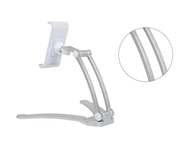 Silver aluminum desktop tablet stand with white ABS base, showing adjustable clip holding a tablet.