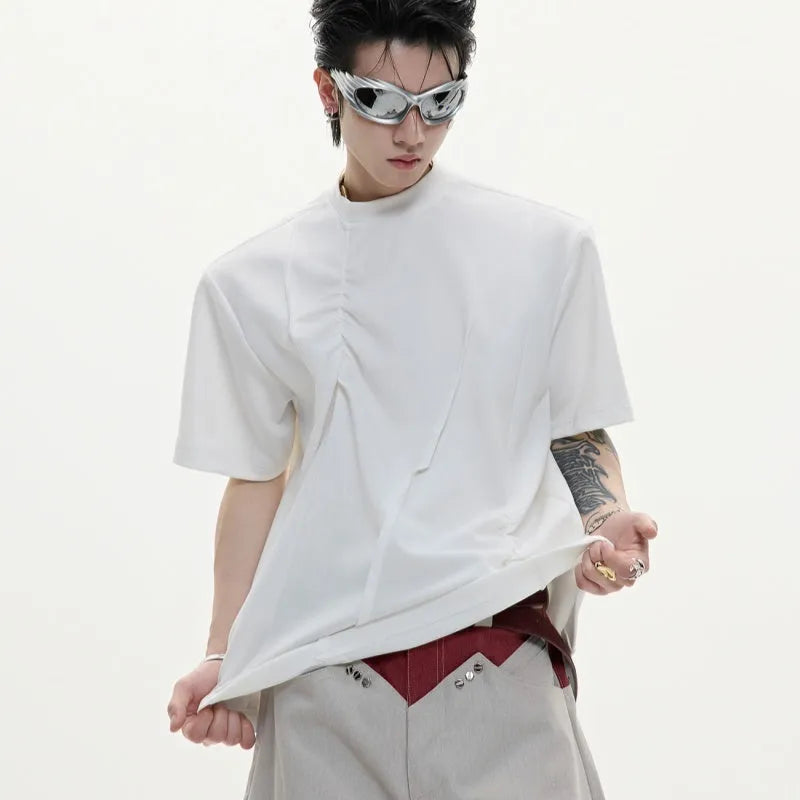 Men's loose fit grey cotton T-shirt with pleated detail and asymmetric stitching on a short sleeve.