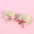 Handmade adjustable bowknot paper hat for dog or cat showing cartoon style design