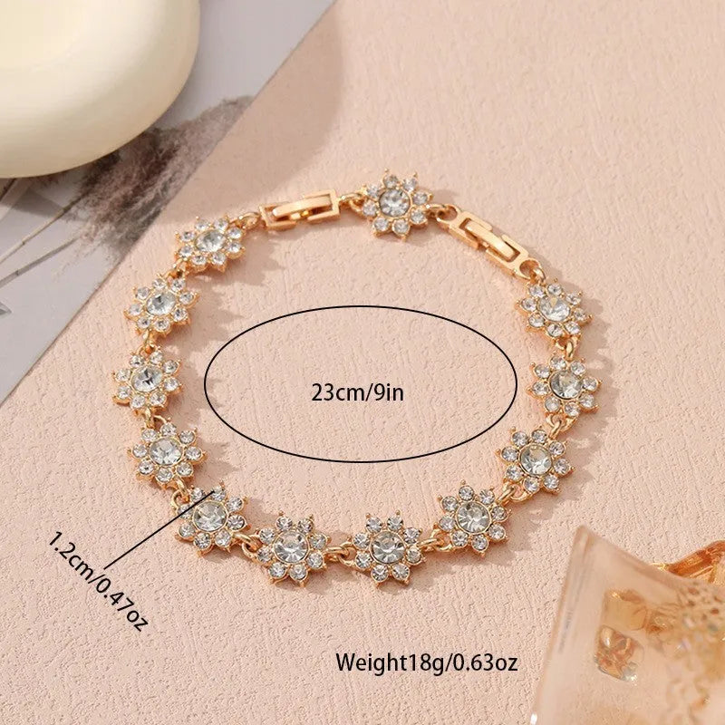 Women's zinc alloy floral bracelet with electroplated finish showing colour variations