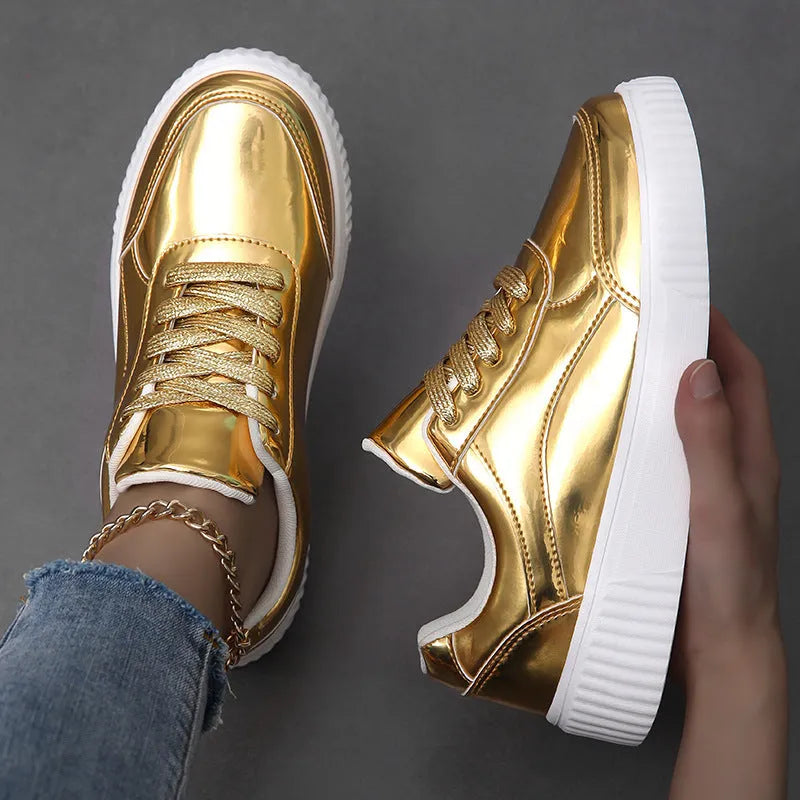 Sequin platform sneakers with thick sole in rose gold colour showing round toe and decorative stitching