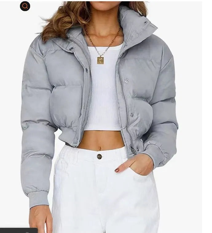 Women's loose polyester jacket in beige, black, blue or milky white colours with regular long sleeves