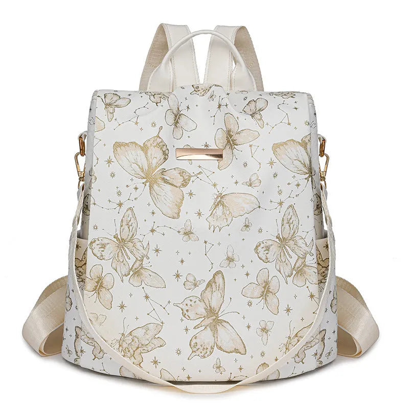 Butterfly printed PU backpack in blue with large capacity shoulder bag design and sewing line detailing