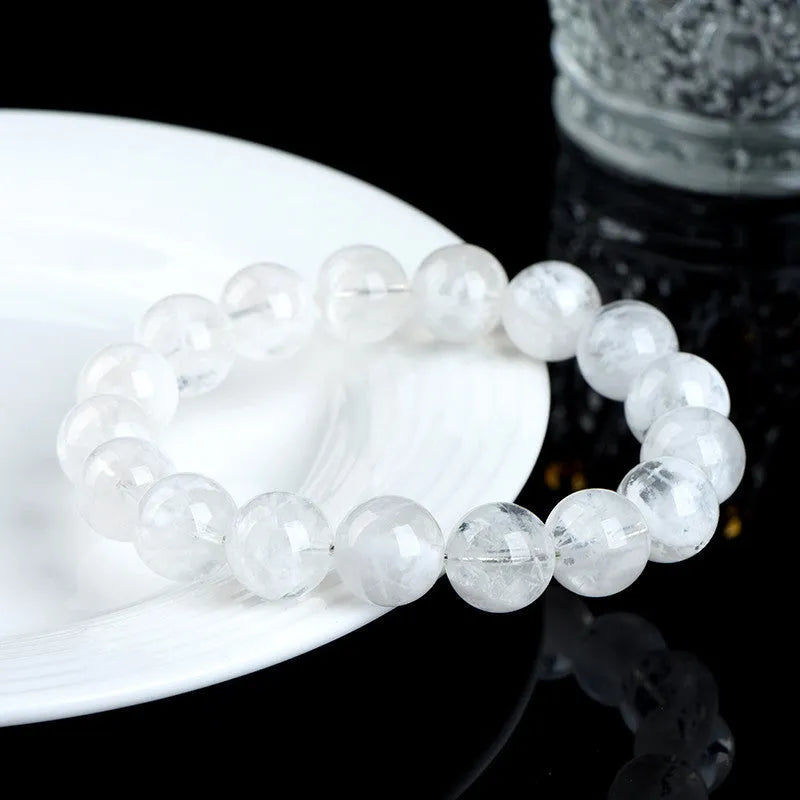 Women's crystal bracelet with natural blizzard snowflake round beads in geometric shape with Ruyi and Xiangyun design elements