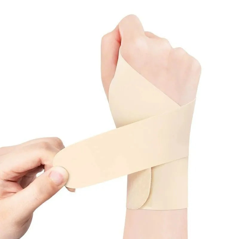 Adjustable athletic wristguard for sports like badminton and tennis, shown in black colour.