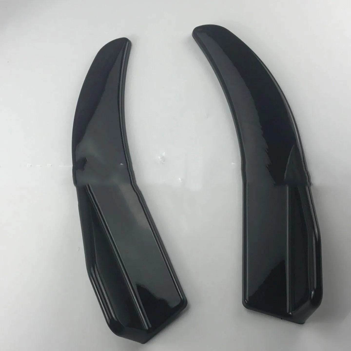 Pair of black ABS plastic car deflector lights for front and rear installation on General Motors vehicles.