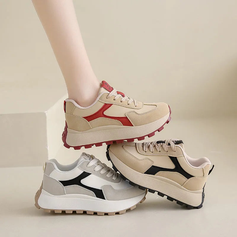Women's low-top platform sneakers in Card Black with a flat rubber sole and front lace-up closure.