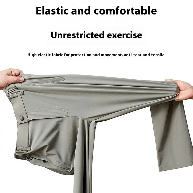 Men's black ice silk loose-fit straight leg trousers with elastic waistband laid flat.