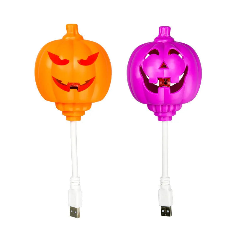 Plastic pumpkin-shaped decorative lamp with USB charging port, showing yellow or purple light option.