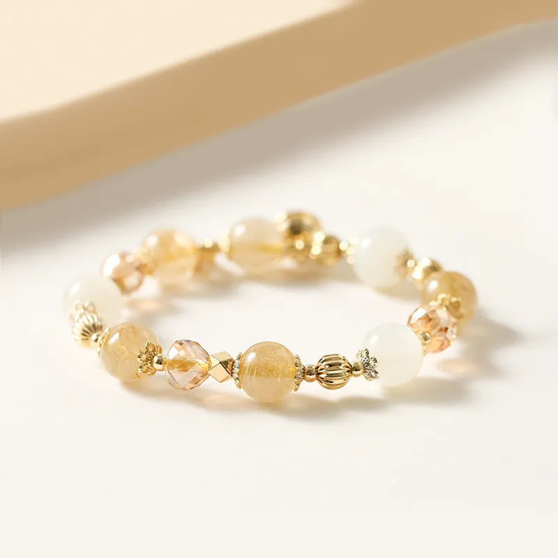 Gold electroplated rutilated quartz bracelet with ringing bell design in Korean style