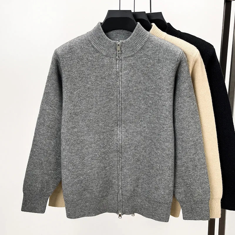 Men's grey stand collar knitted zip cardigan with a loose, thickened fit on a hanger.