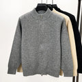 Men's grey stand collar knitted zip cardigan with a loose, thickened fit on a hanger.