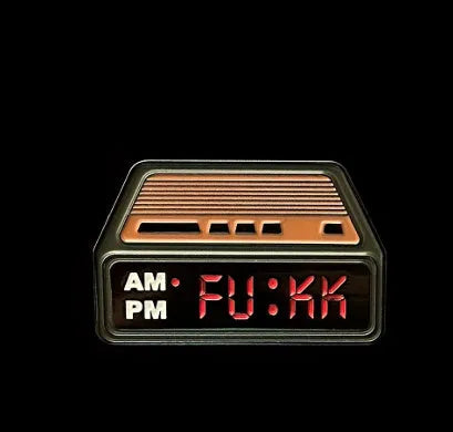 Creative Home black metal retro alarm clock brooch pin with original design on a jacket lapel