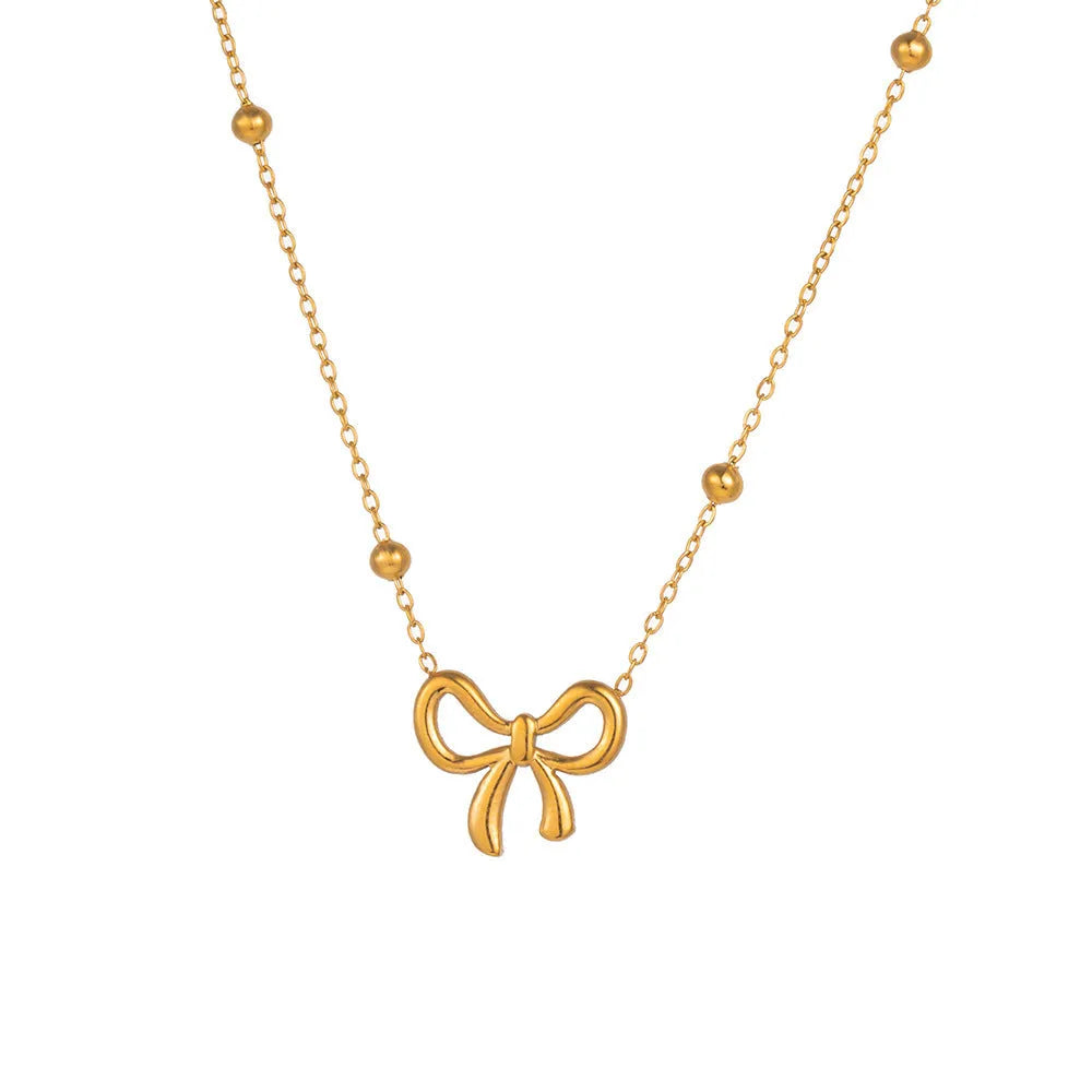 Gold electroplated bow pendant necklace on adjustable titanium steel chain