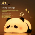 Cartoon panda head night light with silicone construction and warm white glow