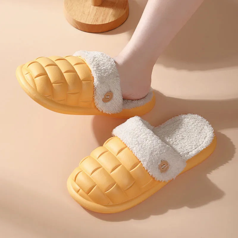 Women's pink and grey plaid detachable slippers with plush lining and a textured non-slip sole.
