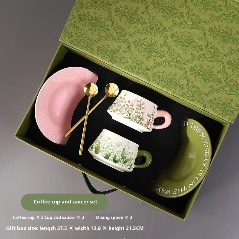 Ceramic coffee cup and saucer set with spoons in hanging bell or Lanling grass couple's cups design.