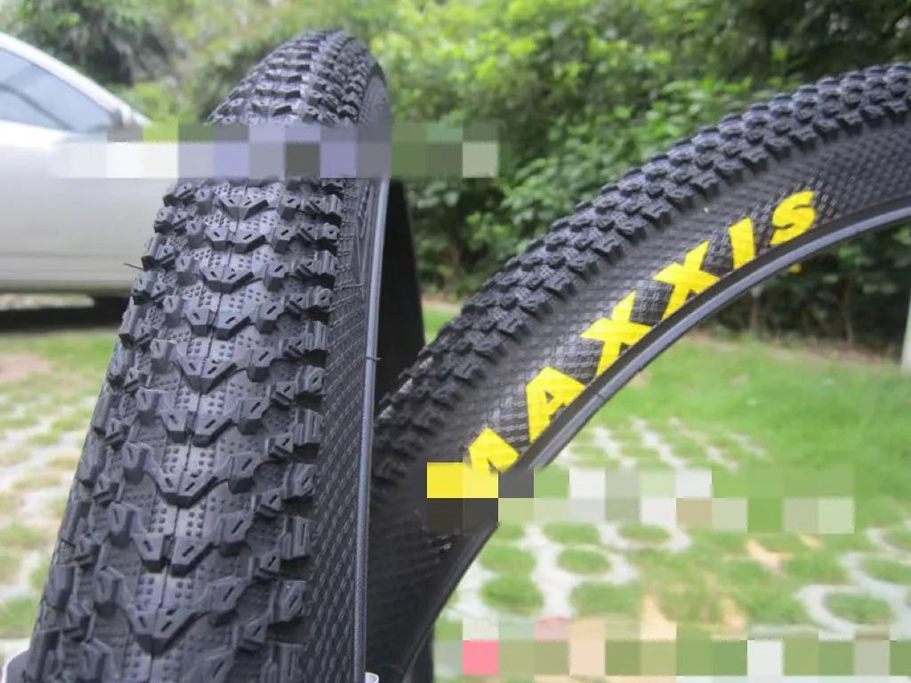 Ultralight mountain bike puncture proof tyre showing tread and available in multiple wheel sizes