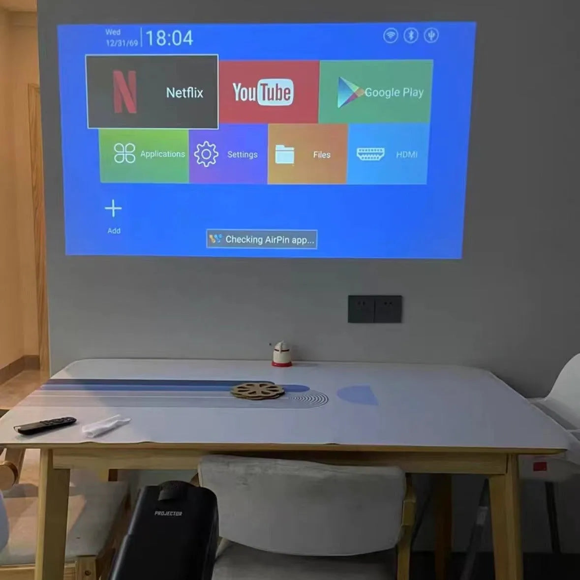 720p wireless game projector with screen handle for home gaming setup