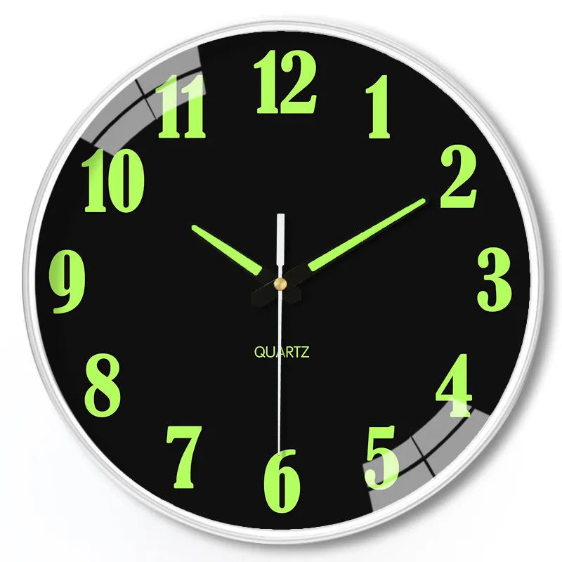 Modern 8 inch diameter luminous wall clock with plastic shell on a wall.