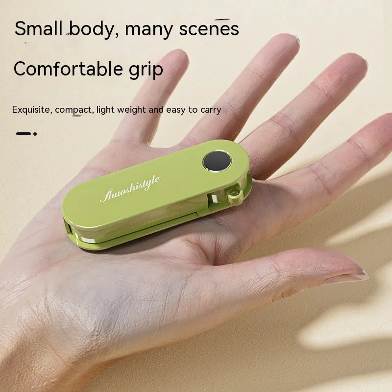 Foldable stainless steel vegetable peeler on white background, compact 91x36x18mm kitchen tool