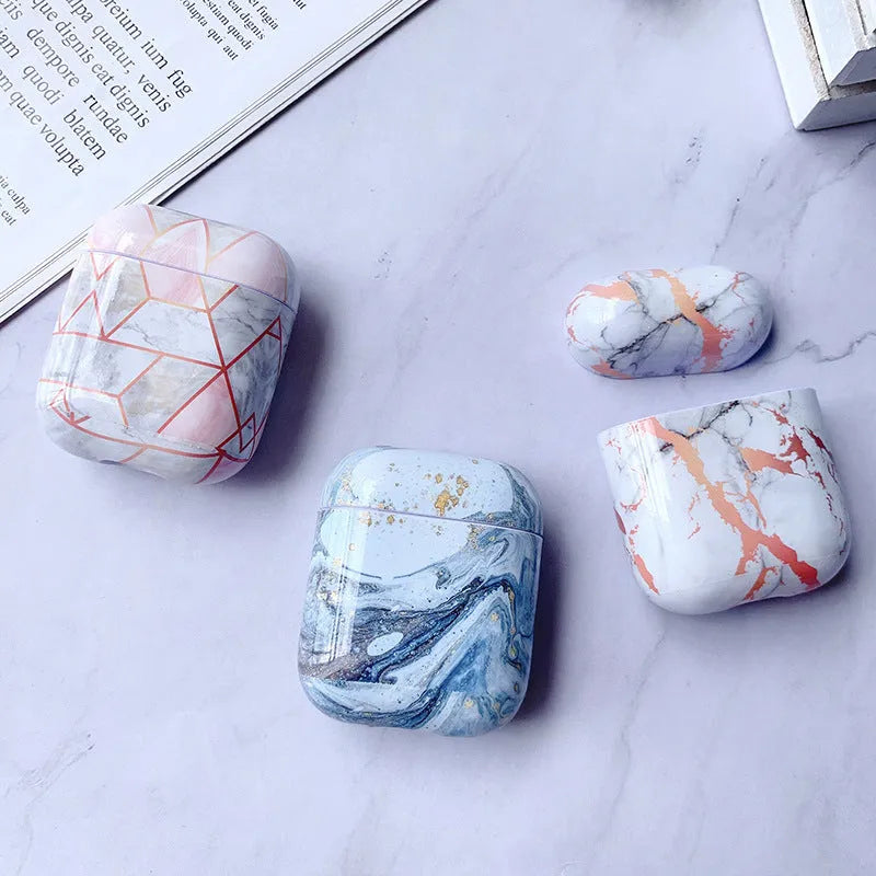 White marble crack pattern hard plastic protective case for Apple AirPods 1 and 2 charging box.