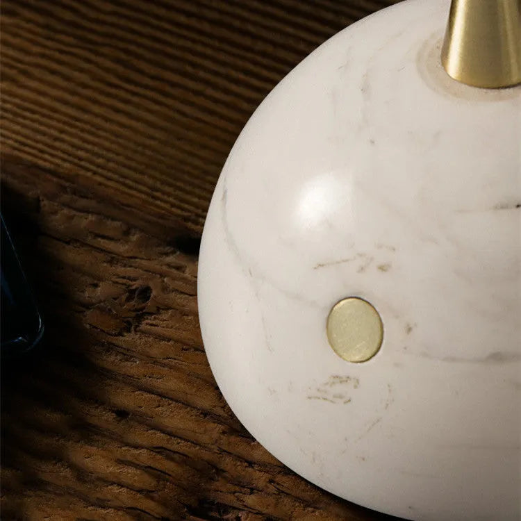 Glass desk lamp with dimmable touch control and LED light source on desk surface