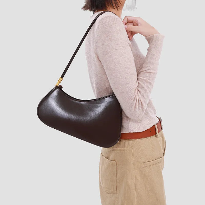 Oval-shaped retro underarm handbag for women in PU with a single shoulder strap, shown in multiple colour options.