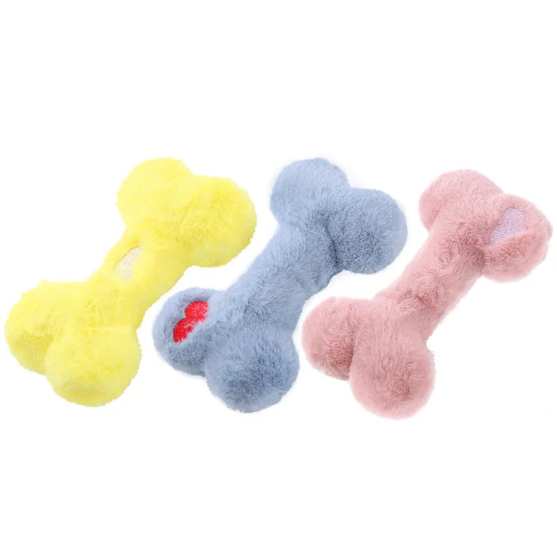 Blue plush love bone dog toy with squeaker for bite-resistant interactive play.