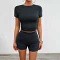 Women's slim-fit viscose sports suit set with short-sleeved t-shirt and elastic shorts in grey blue.