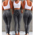 Women's fringed jeans in Cowboy denim, showing fringe detail on leg, available in dark blue, grey, and light blue.