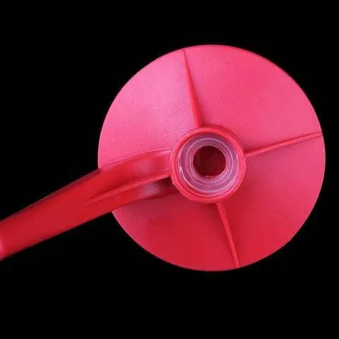 Red Magic Tap soda bottle dispenser attached to inverted 2 litre bottle with push-button mechanism