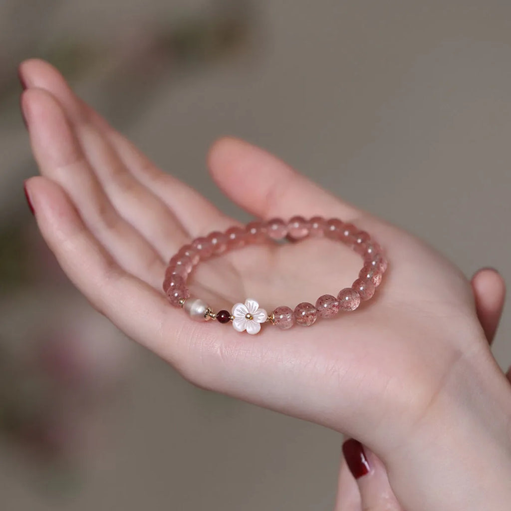Strawberry quartz crystal bracelet with peach blossom flower charm and adjustable clasp