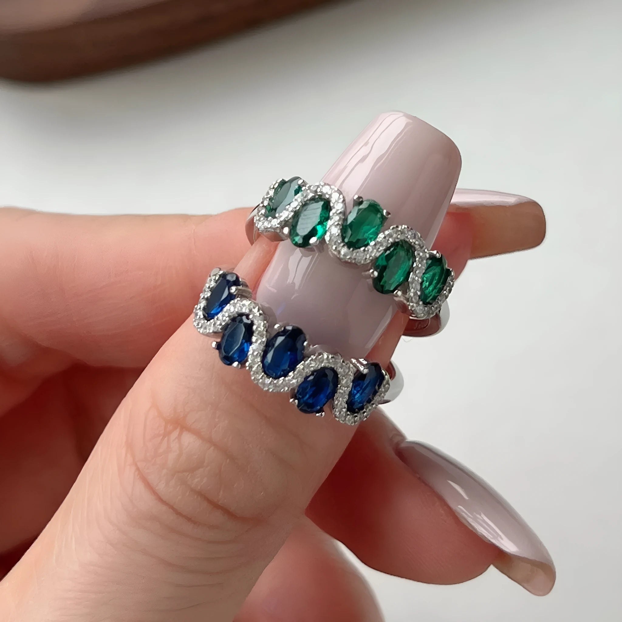 S925 sterling silver oval twisted ring with zircon inlay on white background, women geometric silver ring