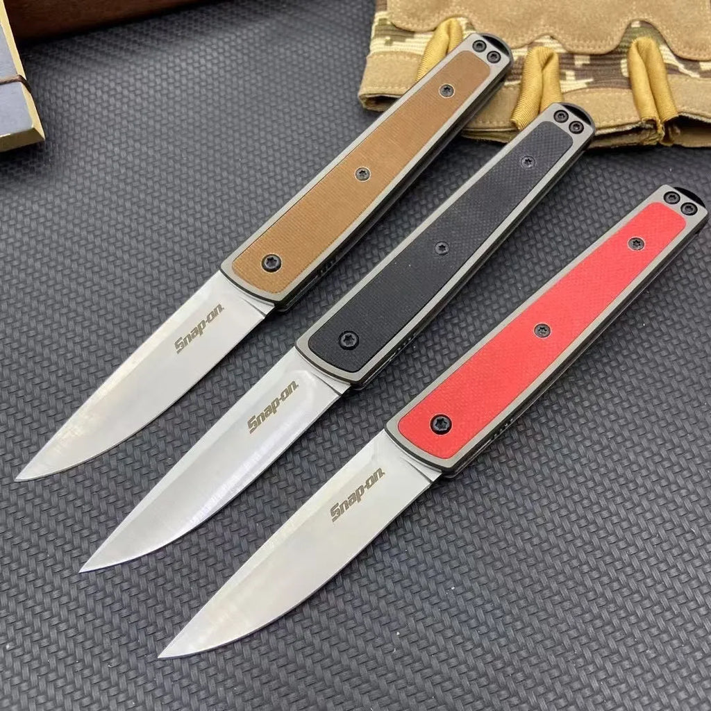 CRKT 7190 folding fruit knife showing black stainless steel blade and handle with dimensions displayed